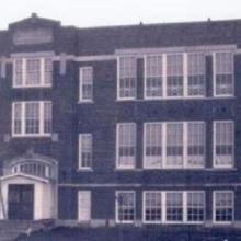 Photo of a brick school building